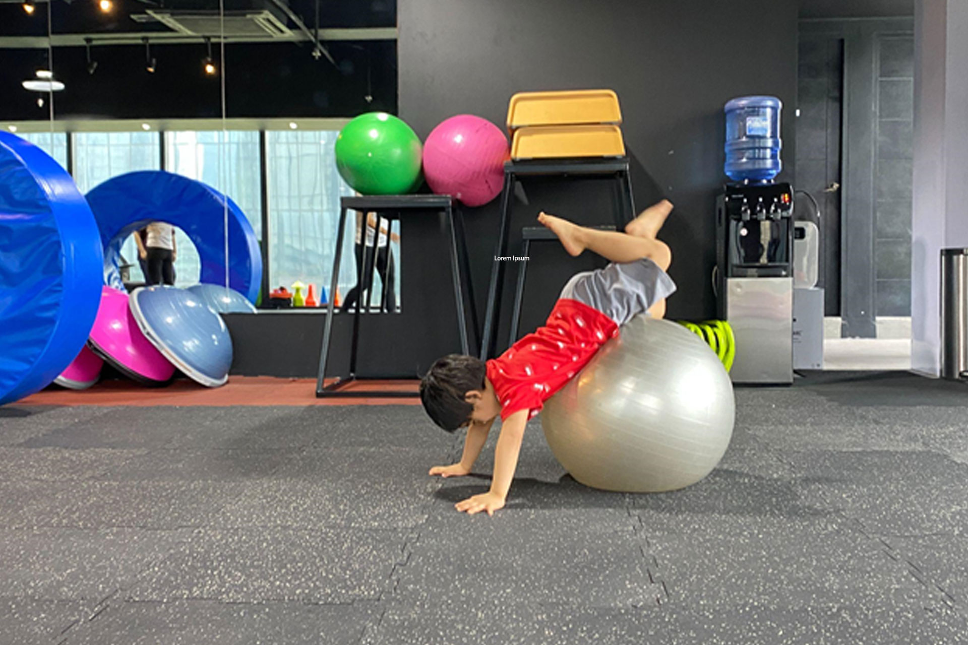 Child playing in small gym
